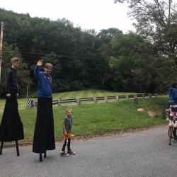 A group of walkers on stilts
