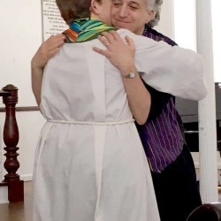 Rev. Patty Fox hugs a congregant