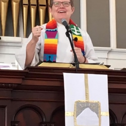 Rev. Patty Fox in the pulpit of the First Congregational Church of Stockbridge