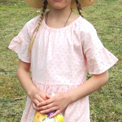 A girl in a pink dress