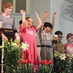 Children sing in the kids choir on Easter Sunday