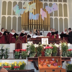 The choir sings an anthem