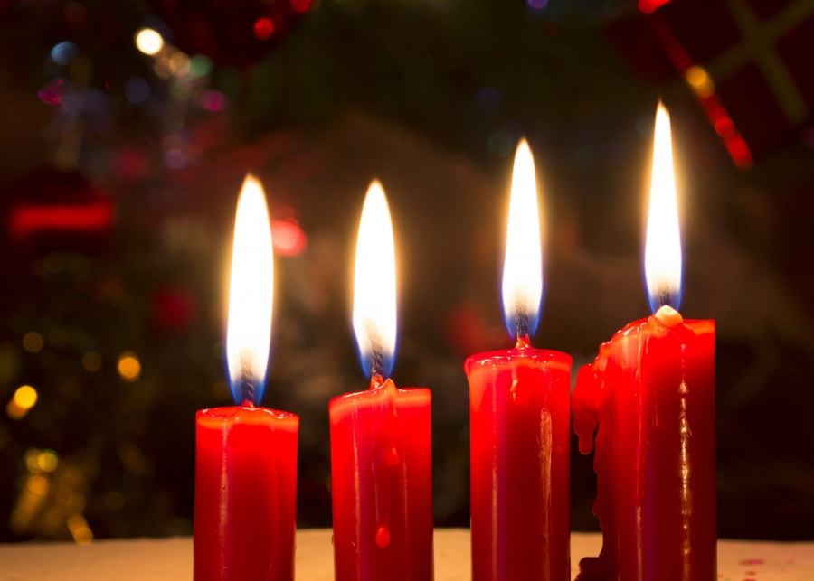 Four red Christmas candles