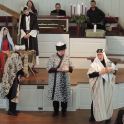 The three wise men bring gifts for Jesus