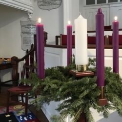 Advent wreath with lit candles
