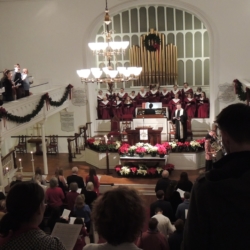 A full view of the sanctuary from the balcony, filled with people